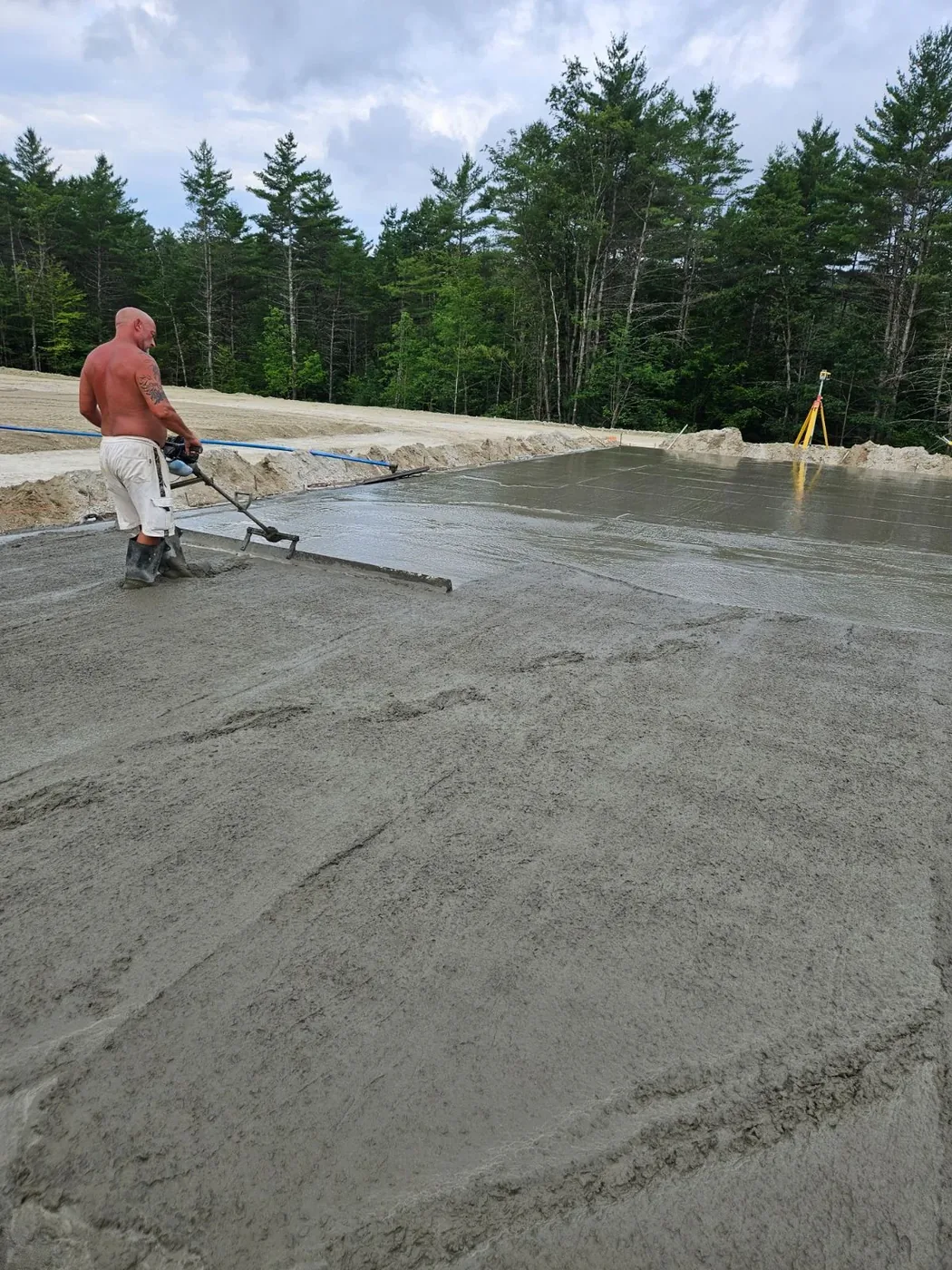 Bernard Concrete slab placement and finishing