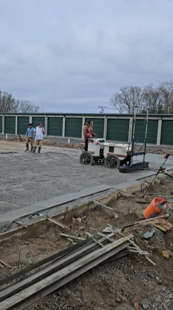 Bernard Concrete slab placement and finishing