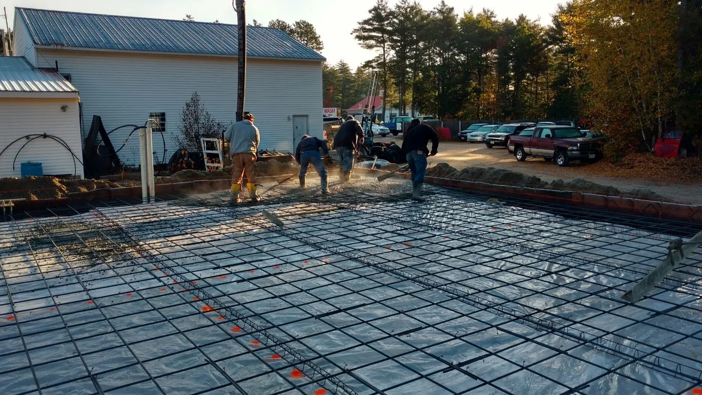 The crew working across a reinforced slab.